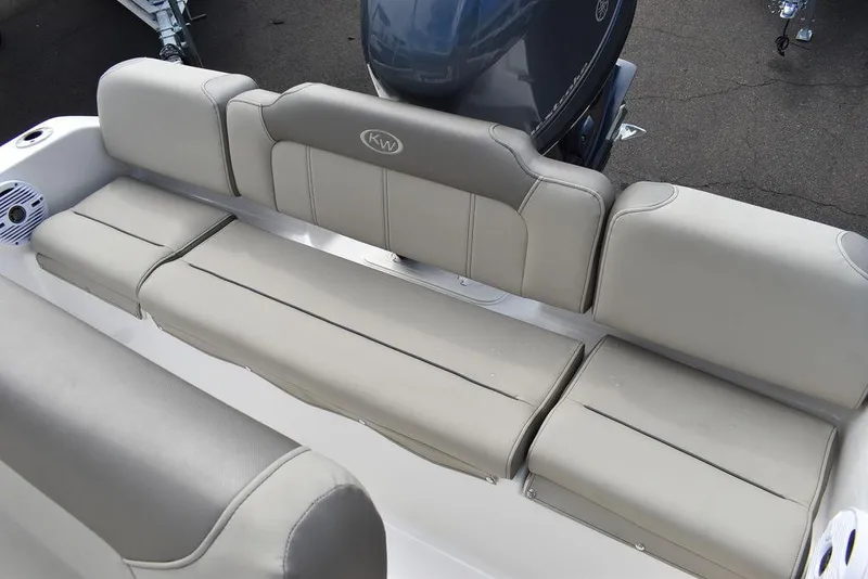 Slide: The Image of 2024 Key West 189 FS boat seating with beige upholstery. - 16
