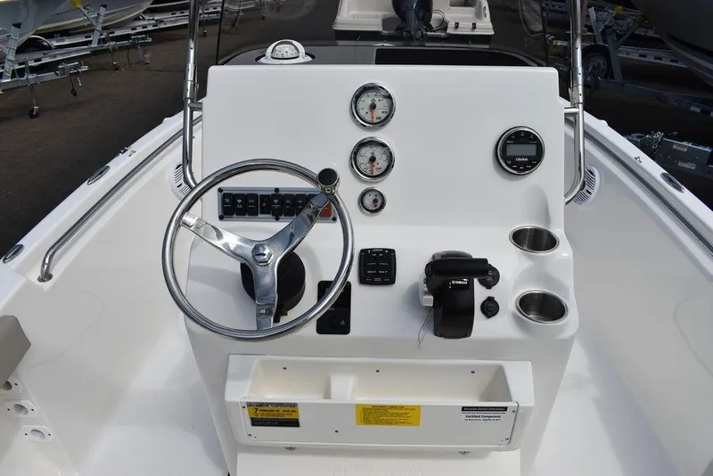 Slide: The Image of 2024 Key West 189 FS boat console with steering wheel and gauges. - 25