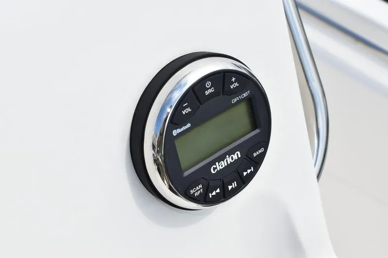 Slide: The Image of Clarion audio system on 2024 Key West 189 FS boat dashboard. - 28