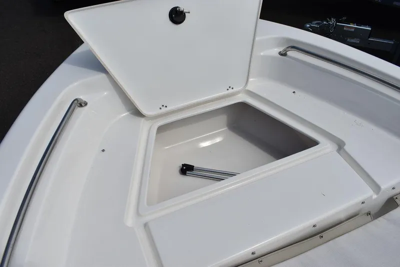 Slide: The Image of 2024 Key West 189 FS boat storage compartment with open hatch. - 34