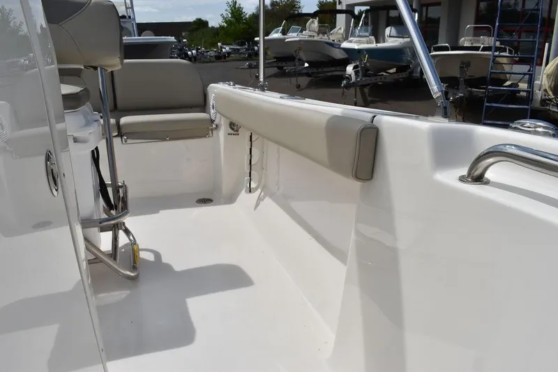 Slide: The Image of 2024 Key West 189 FS boat interior with seating and railing. - 39