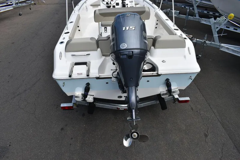 Slide: The Image of 2024 Key West 189 FS boat with 115 HP outboard motor, rear view. - 6