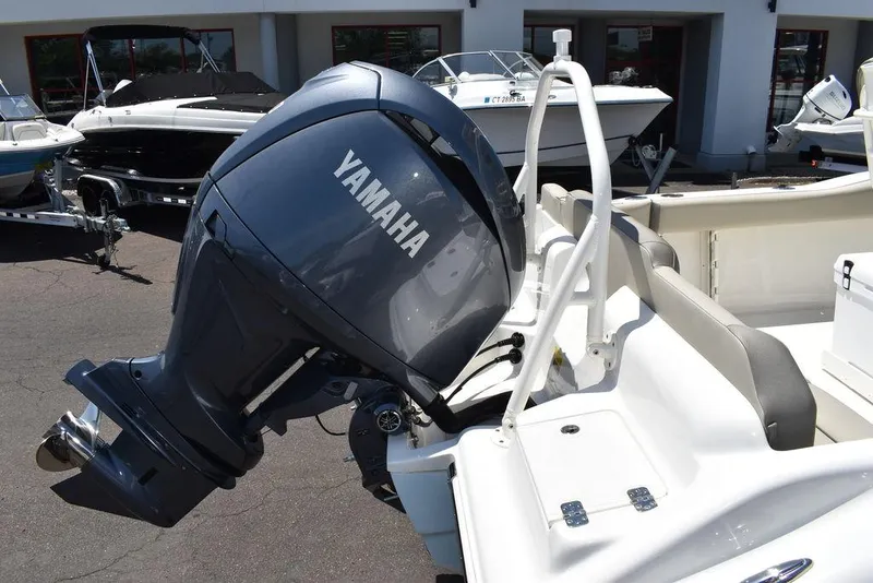 Slide: The Image of 2024 Key West 219 FS boat with Yamaha outboard motor. - 11