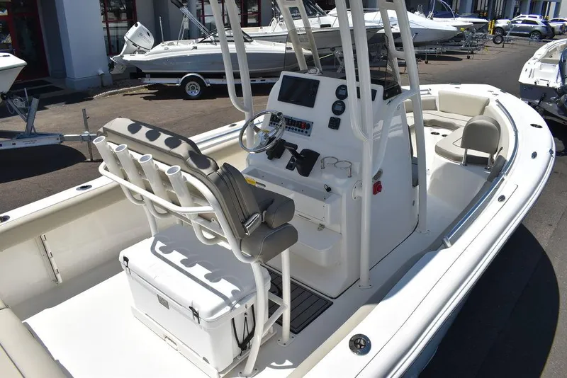 Slide: The Image of 2024 Key West 219 FS center console boat with seating and control panel. - 13