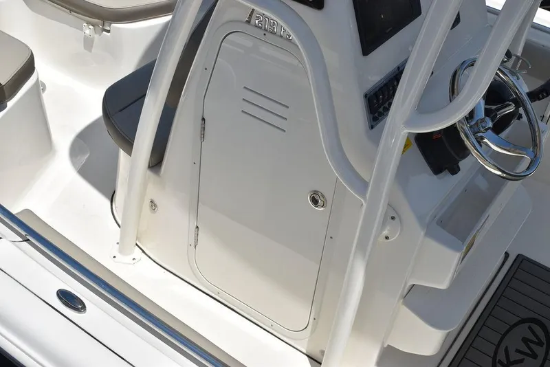Slide: The Image of 2024 Key West 219 FS boat console and seating area. - 18