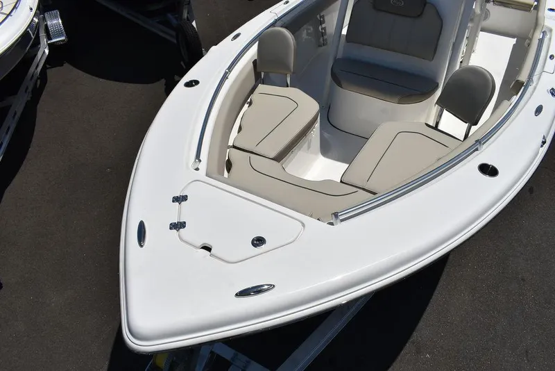 Slide: The Image of 2024 Key West 219 FS boat with spacious seating and storage compartments. - 19