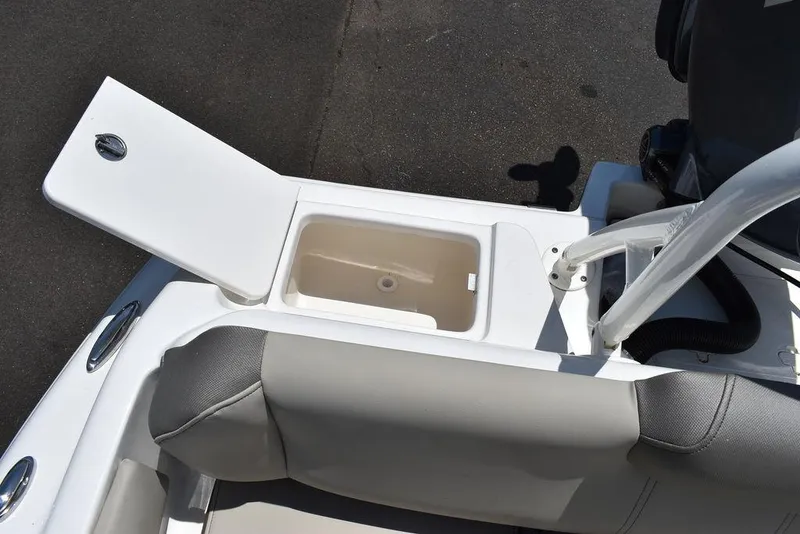 Slide: The Image of 2024 Key West 219 FS boat with open storage compartment. - 30