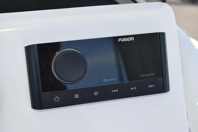 Slide: The Image of Fusion audio system on 2024 Key West 219 FS boat dashboard. - 41
