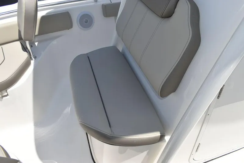 Slide: The Image of 2024 Key West 219 FS boat seat with gray upholstery. - 43