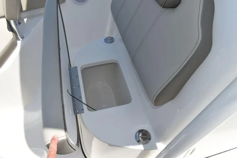 Slide: The Image of 2024 Key West 219 FS boat seat with storage compartment. - 44
