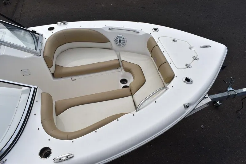 Slide: The Image of 2018 Key West 203DFS boat with beige and white cushioned seating. - 13