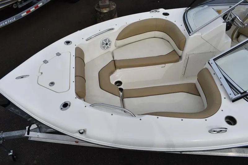 Slide: The Image of 2018 Key West 203DFS boat with beige and white seating area. - 14