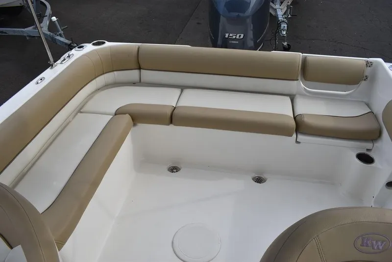 Slide: The Image of 2018 Key West 203DFS boat with beige and white seating area. - 21