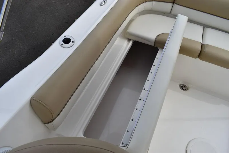 Slide: The Image of 2018 Key West 203DFS boat interior seating and storage compartment. - 22