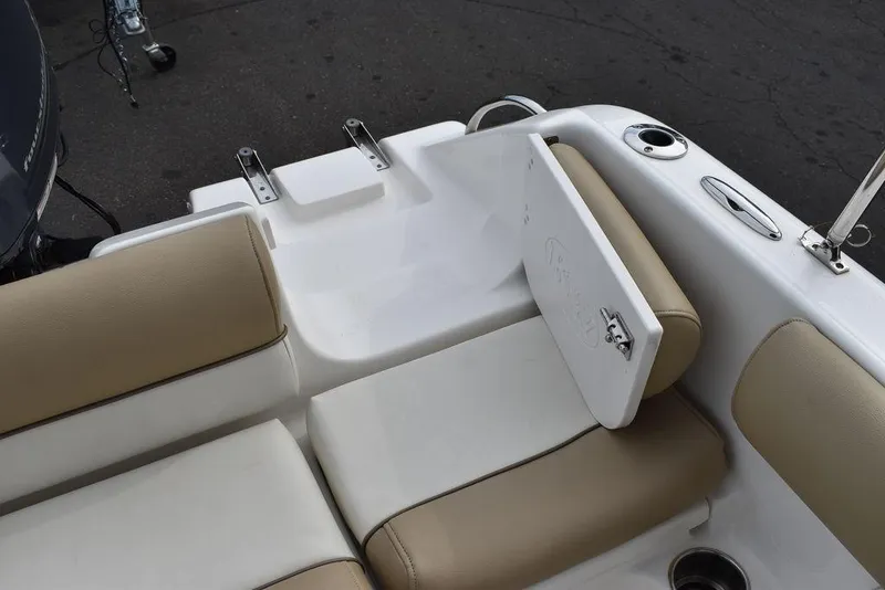 Slide: The Image of 2018 Key West 203DFS boat interior with beige and white seating. - 24