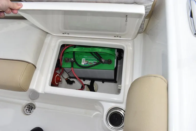 Slide: The Image of 2018 Key West 203DFS boat battery compartment with green battery. - 25