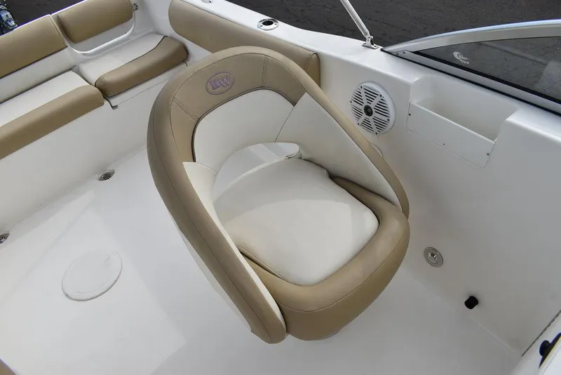 Slide: The Image of 2018 Key West 203DFS boat interior with beige and white seating. - 35