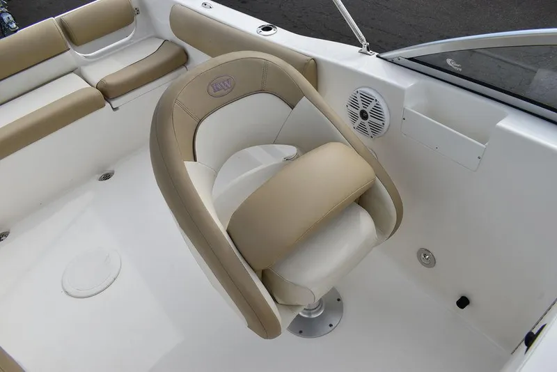 Slide: The Image of 2018 Key West 203DFS boat interior with beige and white seating. - 36