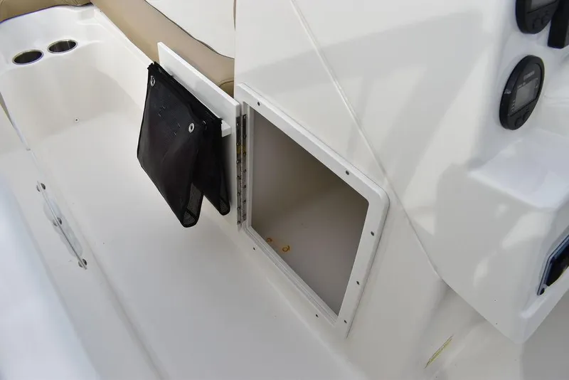 Slide: The Image of 2018 Key West 203DFS boat storage compartment and seating area. - 41