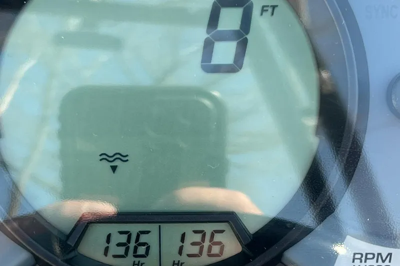 Slide: The Image of Close-up of 2011 Sea-Doo 230 Wake (510 hp) digital display showing 136 hours. - 30