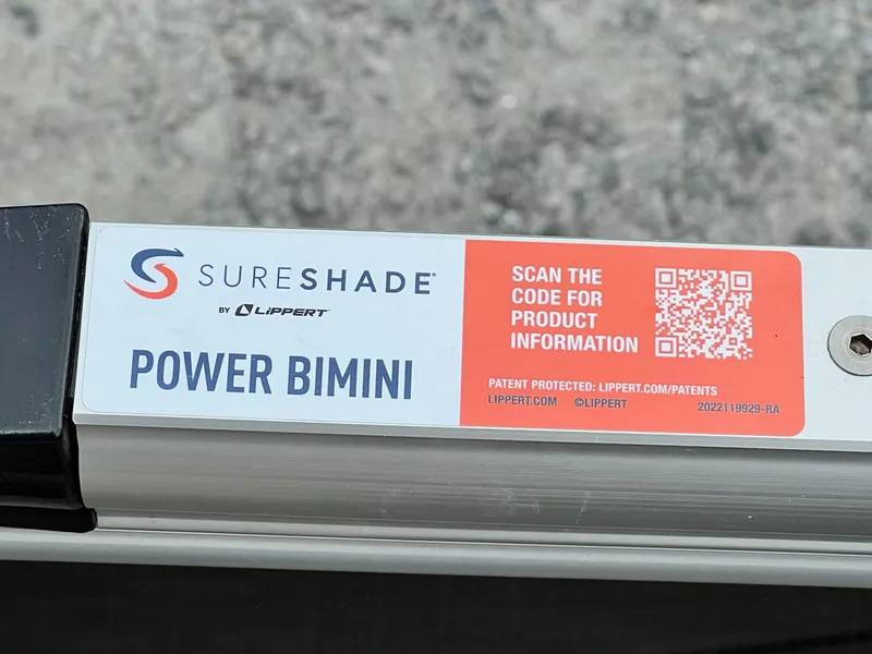 Slide: The Image of SureShade Power Bimini by Lippert on Sylvan 8522 CLZ DH Mirage 2024. - 23