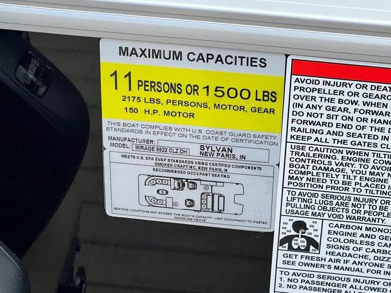Slide: The Image of 2024 Sylvan 8522 CLZ DH Mirage boat capacity label, 11 persons or 1500 lbs. - 25