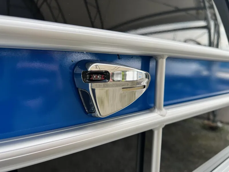 Slide: The Image of Close-up of 2024 Sylvan 8522 CLZ DH Mirage boat's sleek chrome detail. - 3