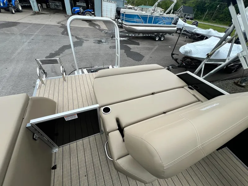 Slide: The Image of 2024 Sylvan 8522 CLZ DH Mirage pontoon boat with beige seating and swim ladder. - 35