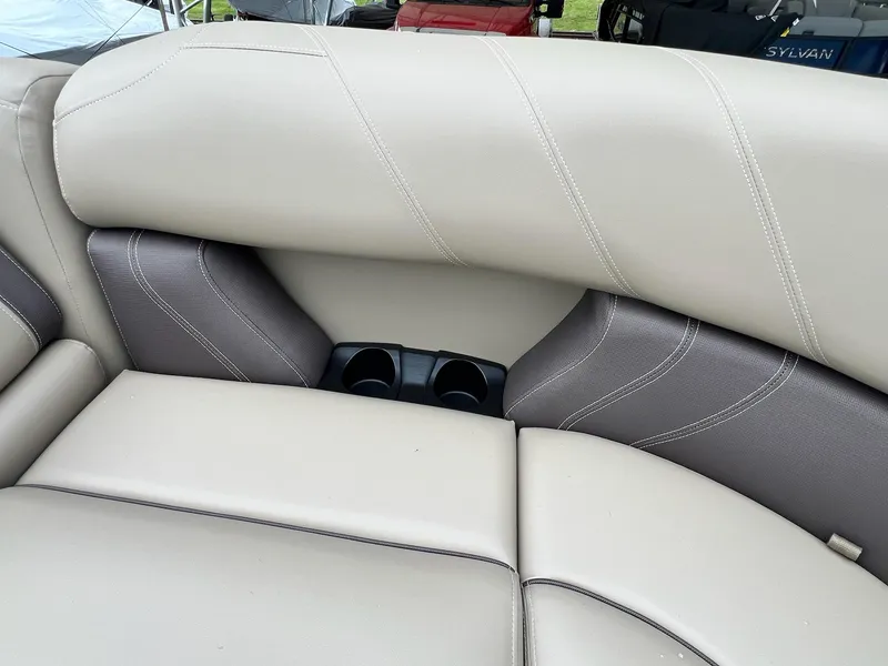 Slide: The Image of 2024 Sylvan 8522 CLZ DH Mirage boat seating with integrated cup holders. - 40