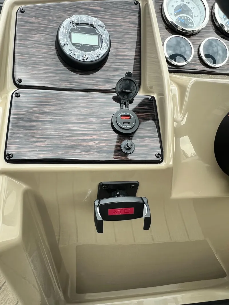 Slide: The Image of 2024 Sylvan 8522 CLZ DH Mirage dashboard with gauges and USB ports. - 41