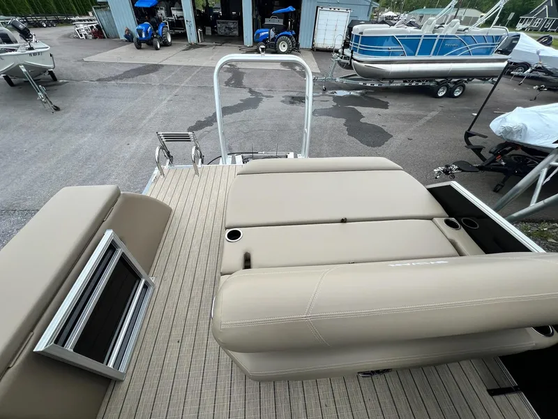 Slide: The Image of 2024 Sylvan 8522 CLZ DH Mirage pontoon boat with beige seating and deck. - 43