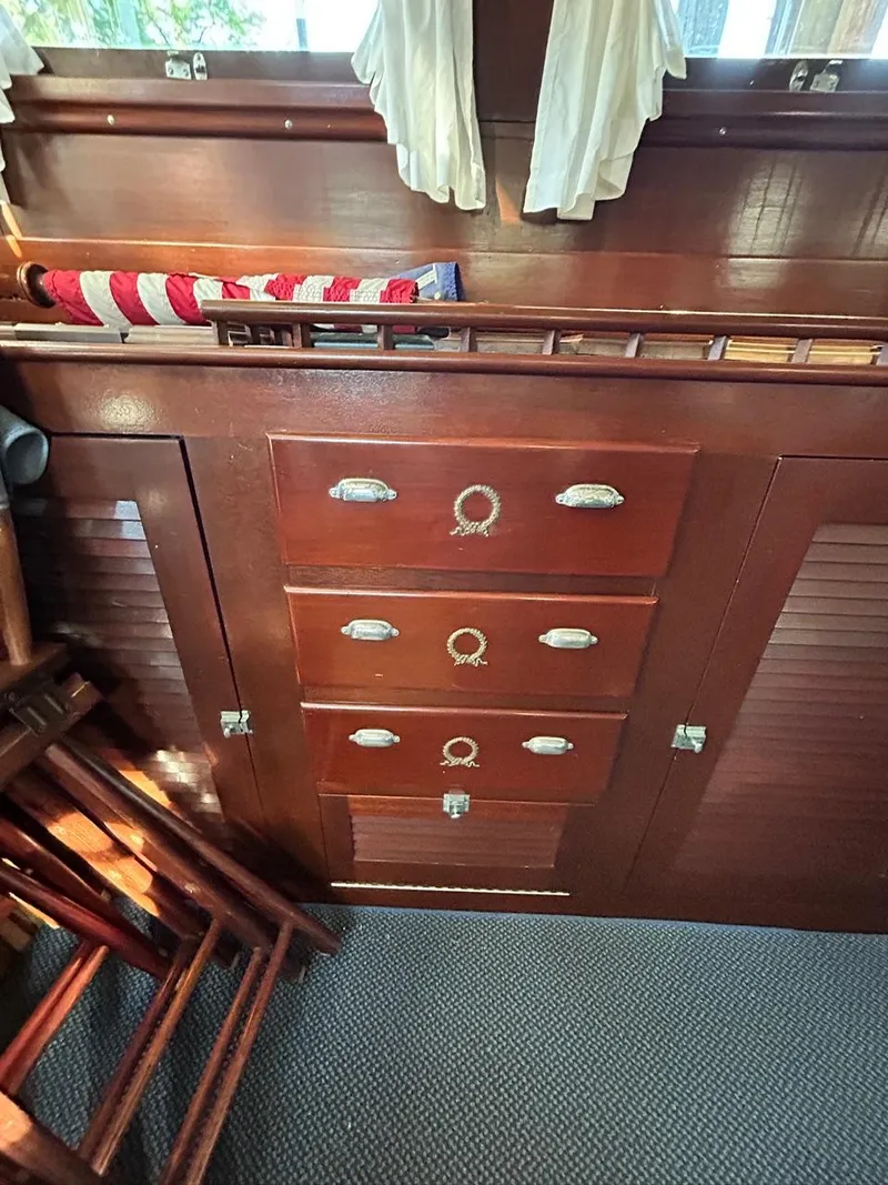 Slide: The Image of Interior of a 1930 Classic ACF 47' Motor Yacht with wooden cabinetry. - 20