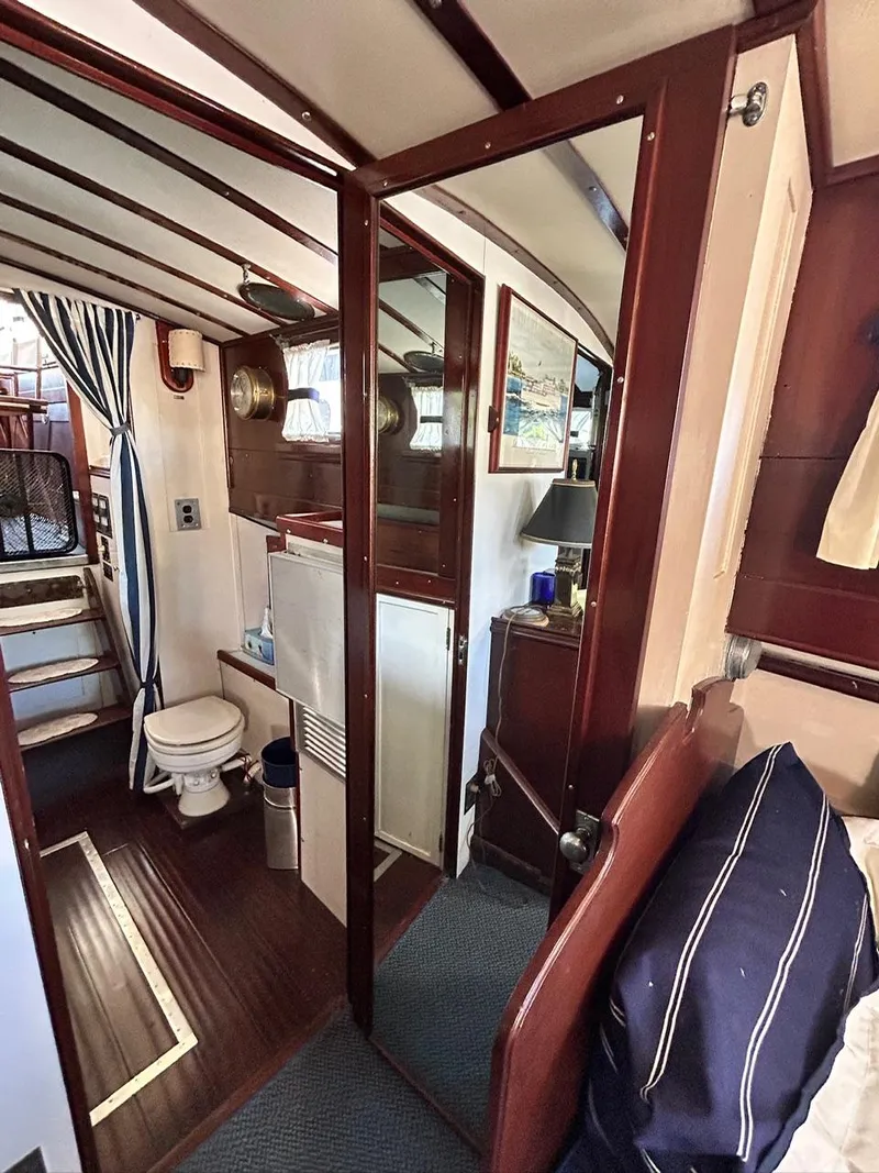 Slide: The Image of Interior of 1930 Classic ACF 47' Motor Yacht with wooden finishes and cozy cabin. - 34