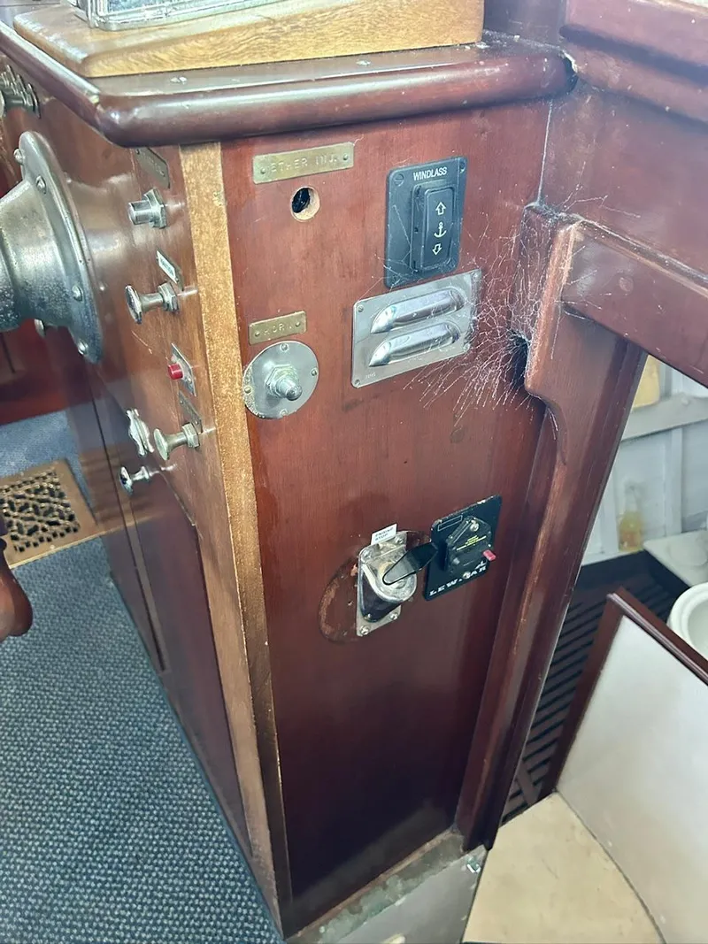 Slide: The Image of Control panel of a 1930 Classic ACF 47' Motor Yacht with vintage switches and dials. - 42