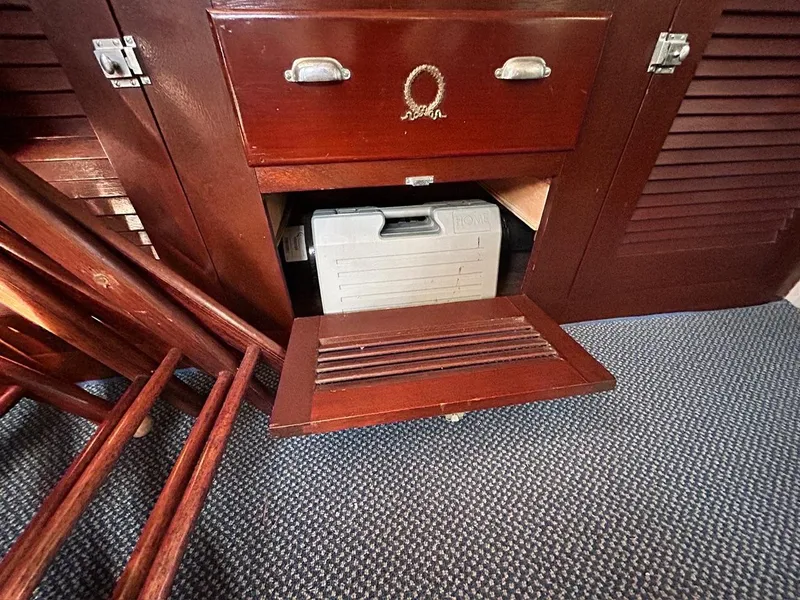 Slide: The Image of Storage compartment on a 1930 Classic ACF 47' Motor Yacht with wooden cabinetry. - 21