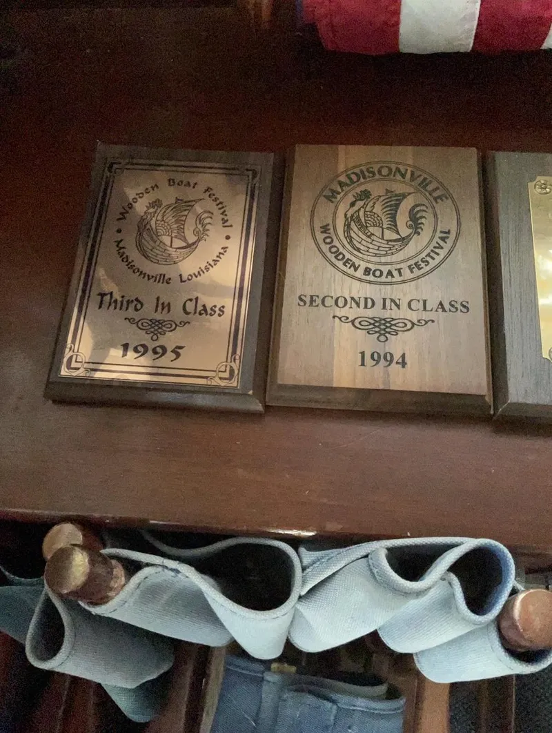 Slide: The Image of 1930 Classic ACF 47' Motor Yacht with award plaques from 1994 and 1995. - 27