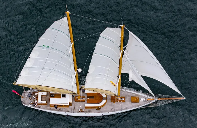 Slide: The Image of Aerial view of 1929 Lyman-Morse Staysail Schooner sailing on the ocean. - 58