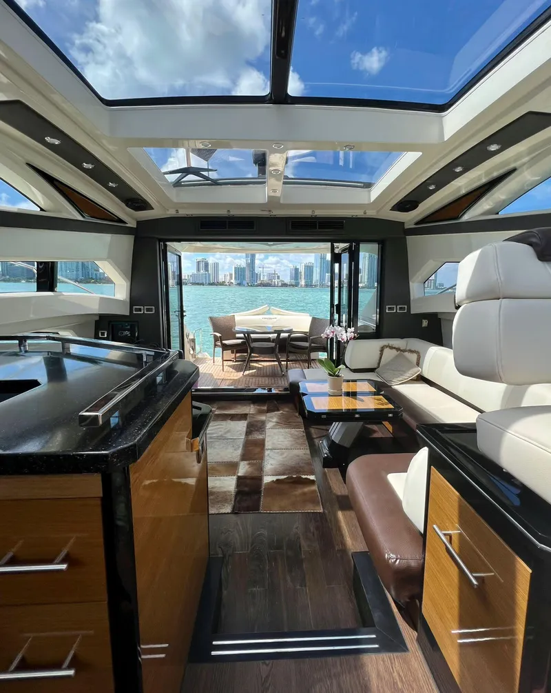 The Image of Interior of 2011 Marquis 500 Sport Coupe yacht with modern design and waterfront view. - 0