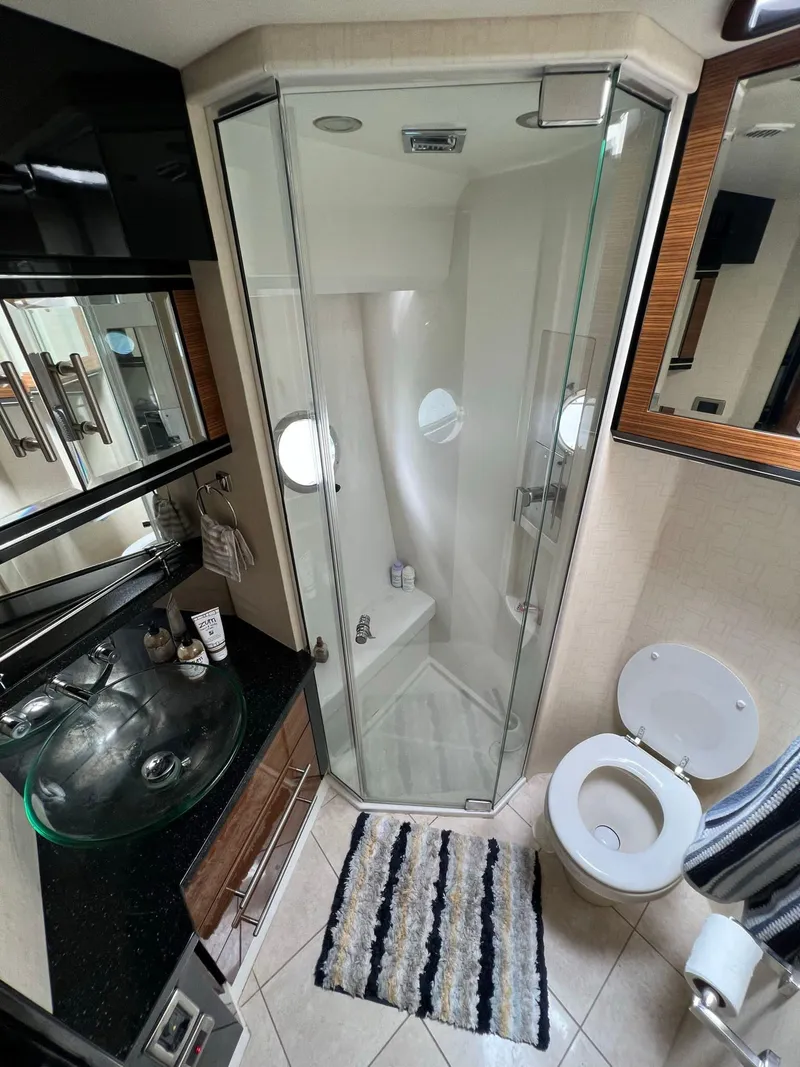 Slide: The Image of Modern bathroom in 2011 Marquis 500 Sport Coupe yacht with glass shower. - 5