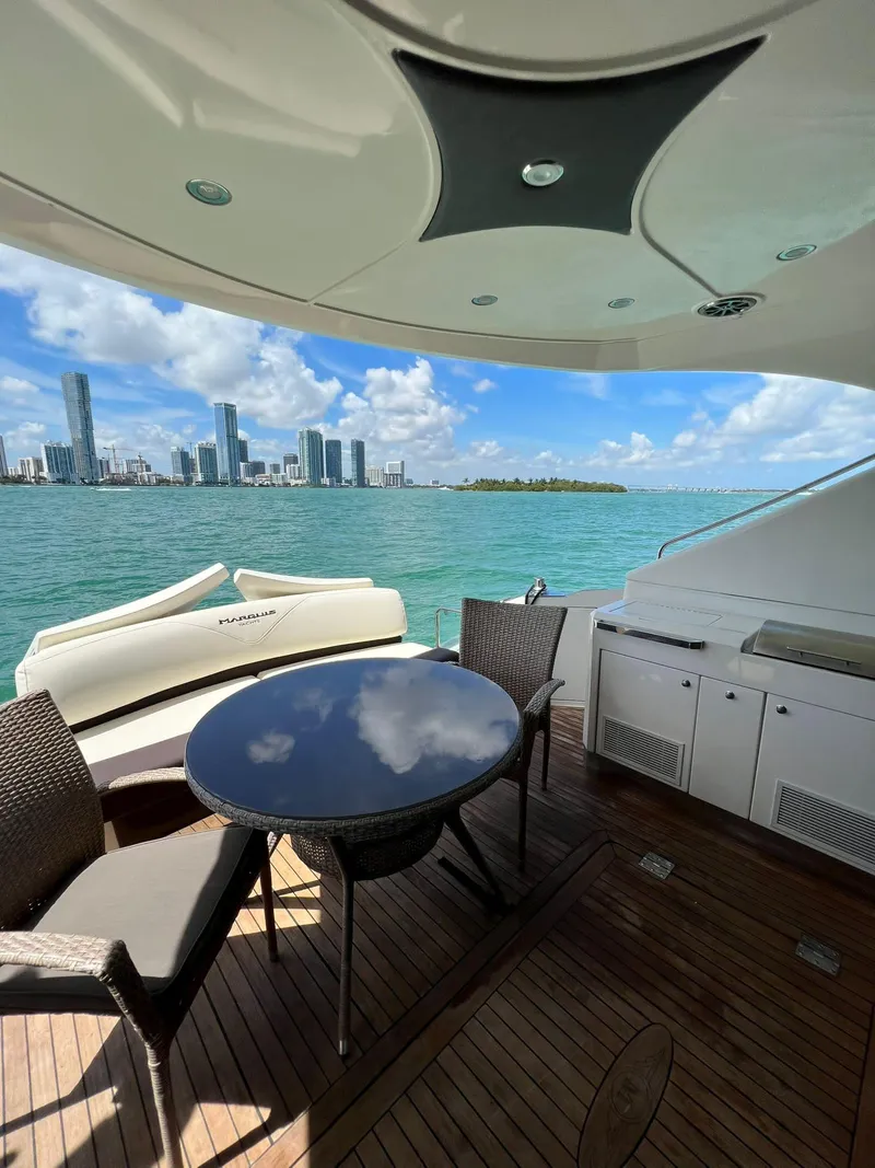 Slide: The Image of Luxury 2011 Marquis 500 Sport Coupe yacht with city skyline view. - 9