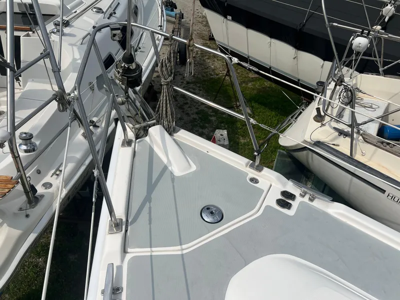 Slide: The Image of 2005 Hunter 36 sailboat deck with stainless steel railings and rigging. - 14
