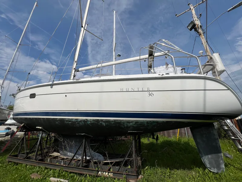 Slide: The Image of 2005 Hunter 36 sailboat on stands, ready for maintenance. - 5
