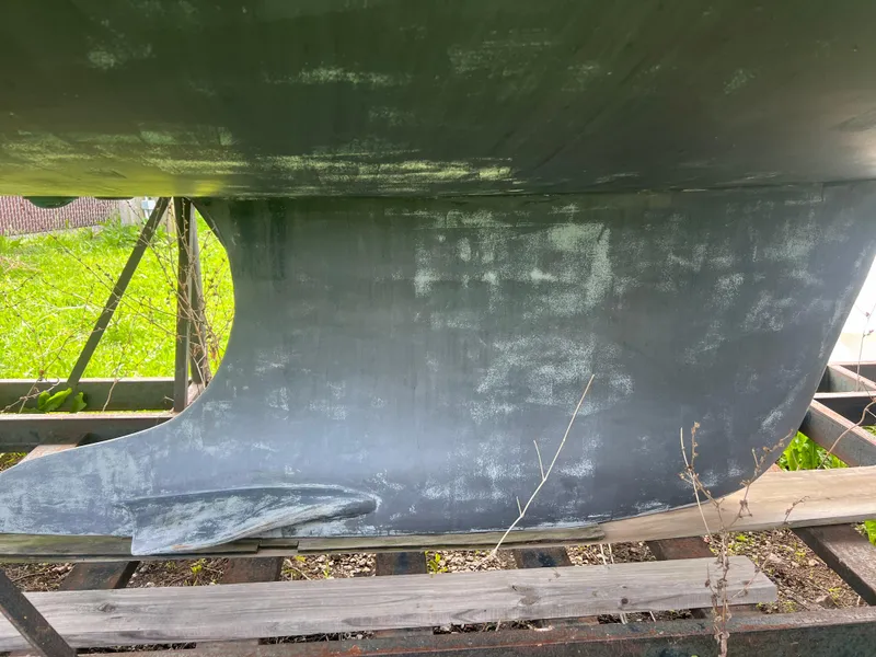 Slide: The Image of 2005 Hunter 36 sailboat keel on a trailer for maintenance. - 8