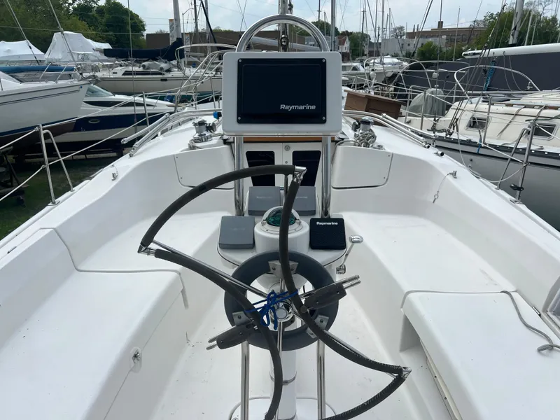 Slide: The Image of Cockpit of a 2005 Hunter 36 sailboat with Raymarine navigation system. - 9