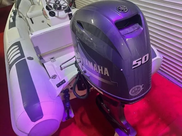 Slide: The Image of 2021 Novurania 360 DL with Yamaha 50 outboard motor on red carpet. - 3