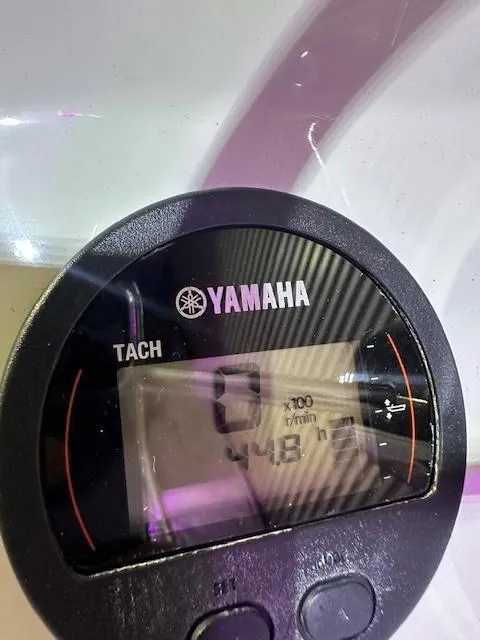 Slide: The Image of Yamaha tachometer on a 2021 Novurania 360 DL boat displaying 448 hours. - 5