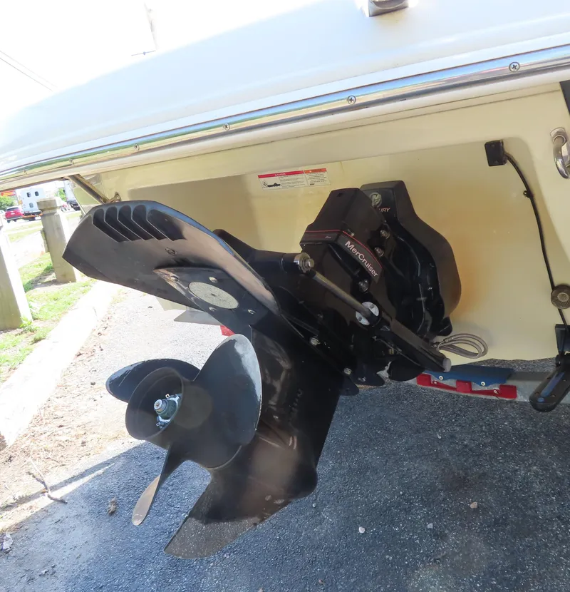 Slide: The Image of Close-up of a 2013 Stingray 195LX boat propeller and stern drive. - 19