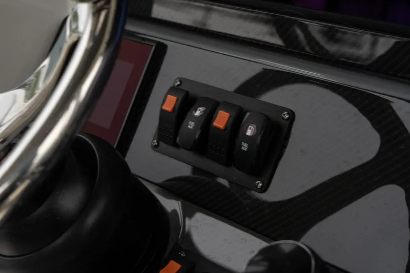 Slide: The Image of Close-up of the control panel on a 2025 Blackwood 290 OPEN boat. - 29