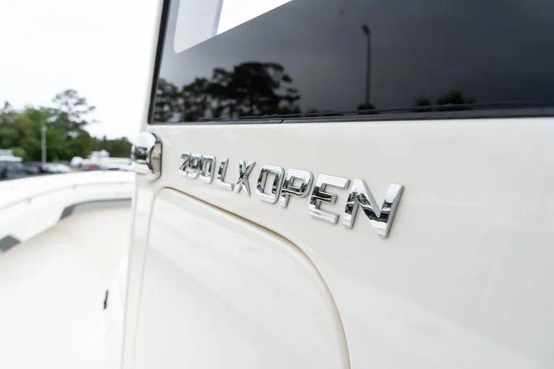 Slide: The Image of Close-up of 2025 Blackwood 290 OPEN boat model nameplate. - 35