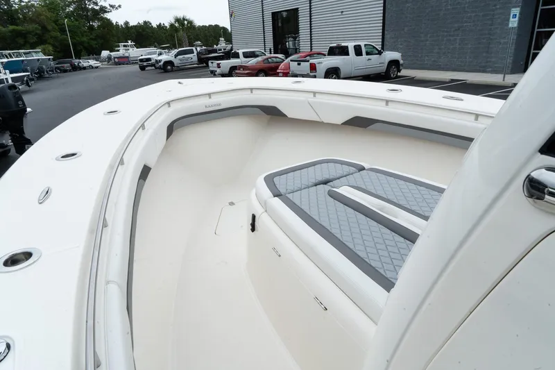 Slide: The Image of 2025 Blackwood 290 OPEN boat interior with seating and storage compartments. - 41
